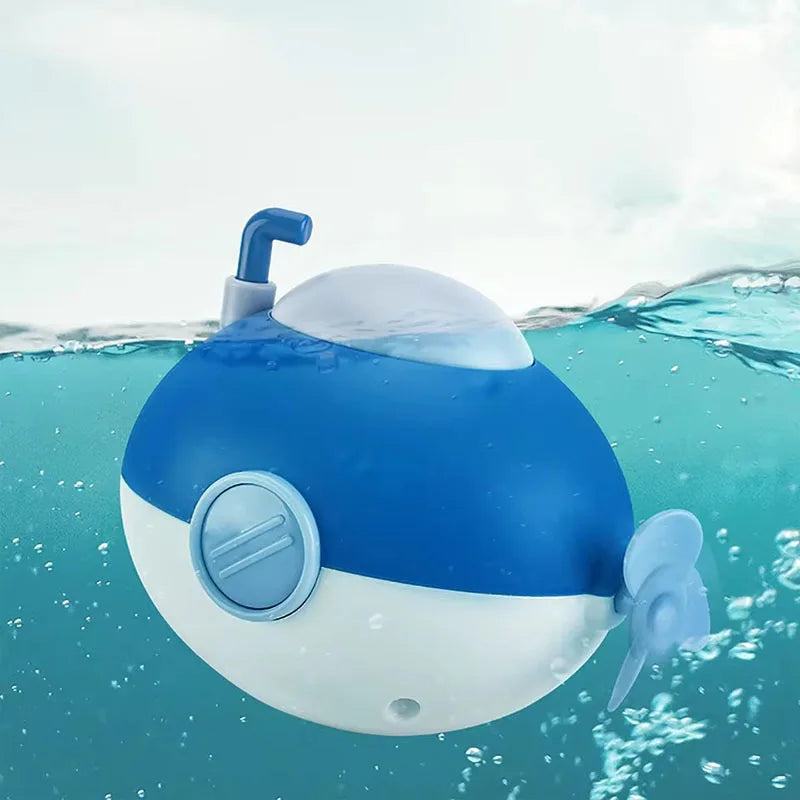 Baby takes a bath and plays in the water, Submarine, winding up animal chain, playing in the bathroom, children's toys