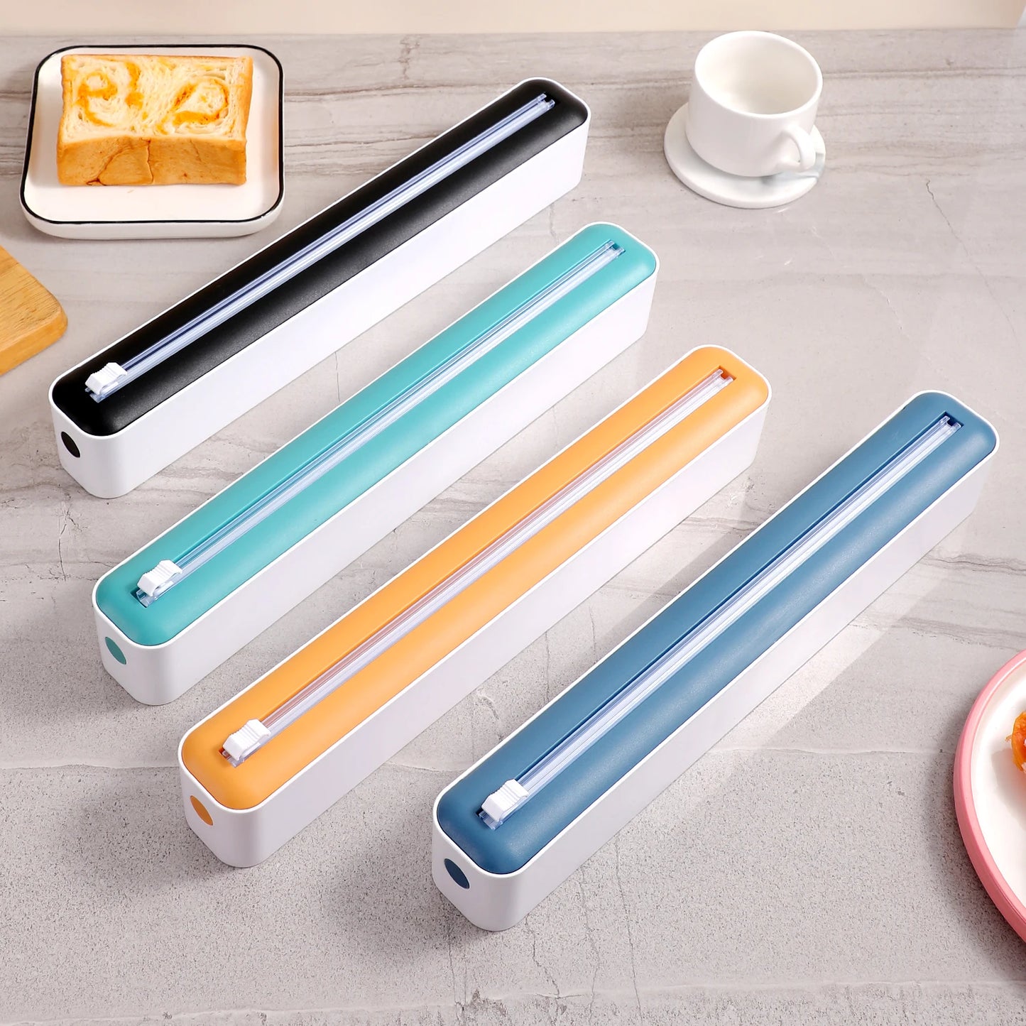 Household multi-functional cling film cutter, tear-free sliding cutter suitable for plastic cling film and aluminum foil.