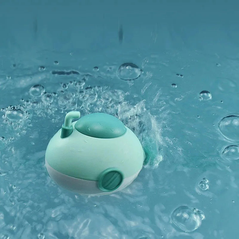 Baby takes a bath and plays in the water, Submarine, winding up animal chain, playing in the bathroom, children's toys