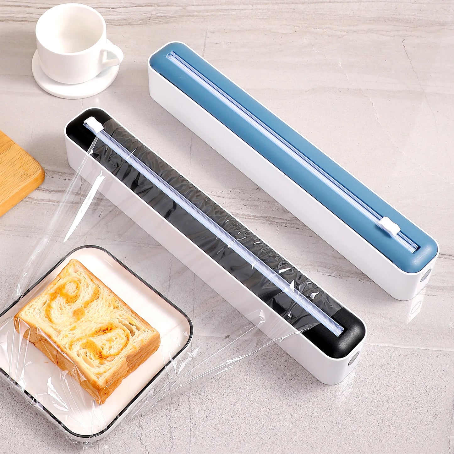 Household multi-functional cling film cutter, tear-free sliding cutter suitable for plastic cling film and aluminum foil.