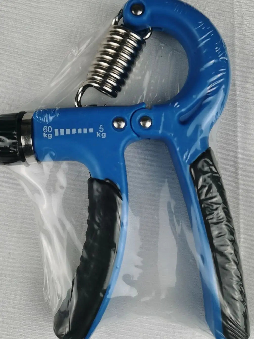 Portable fitness equipment with adjustable blue grip for training hand and arm muscles anytime, anywhere