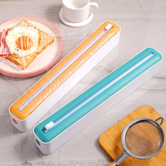 Household multi-functional cling film cutter, tear-free sliding cutter suitable for plastic cling film and aluminum foil.